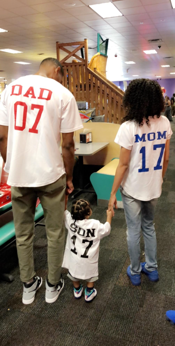 Family wearing matching custom baseball jerseys, customer photo accompanying JestJ Amazon review